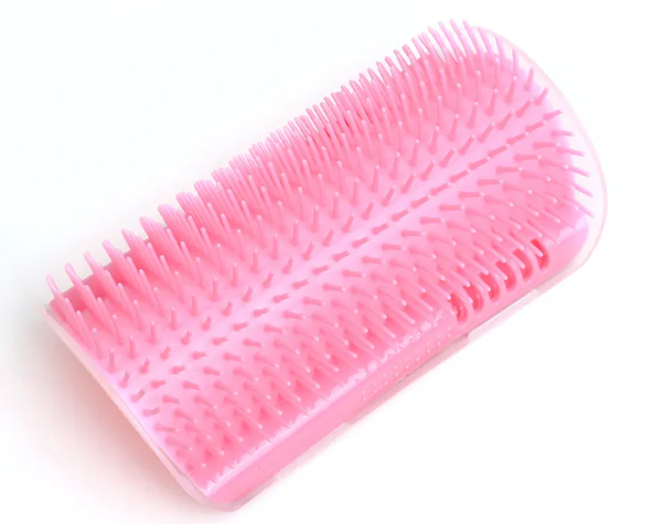 Corner cat scratcher in pink, angled view showing the arched bristle shape