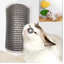 Cat rubbing its face against a corner-mounted self-grooming brush